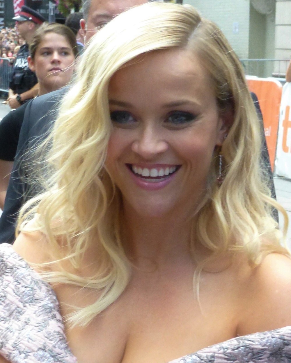 Reese Witherspoon smiling at a premiere