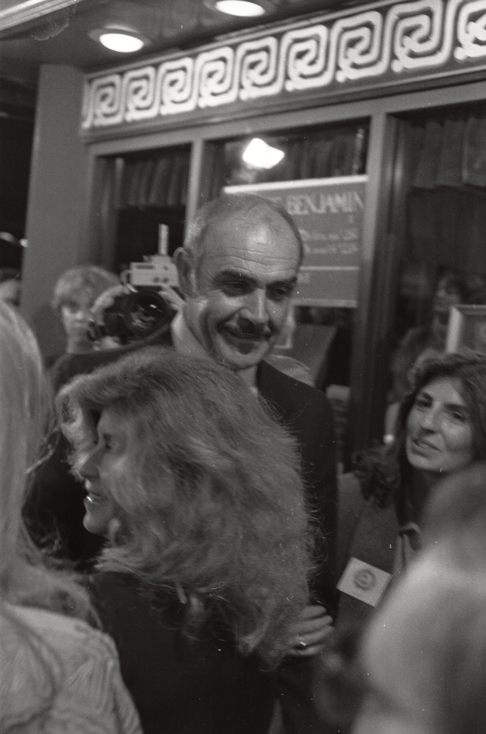 Sean Connery surrounded by fans
